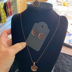 Bronze tone matching necklace, earrings, and ring set